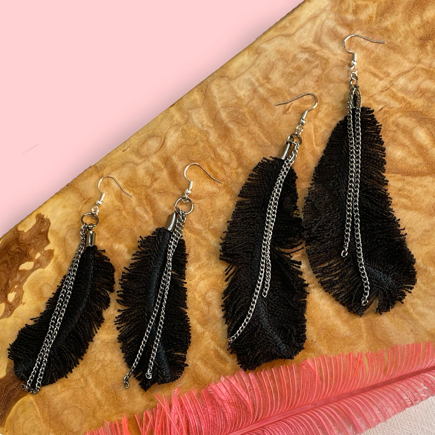 she-bang is upcycled handmade unique feather earrings, unique jewelry, made from recycled denim materials and chains, completely one of a kind jewelry made by local brooklyn designers