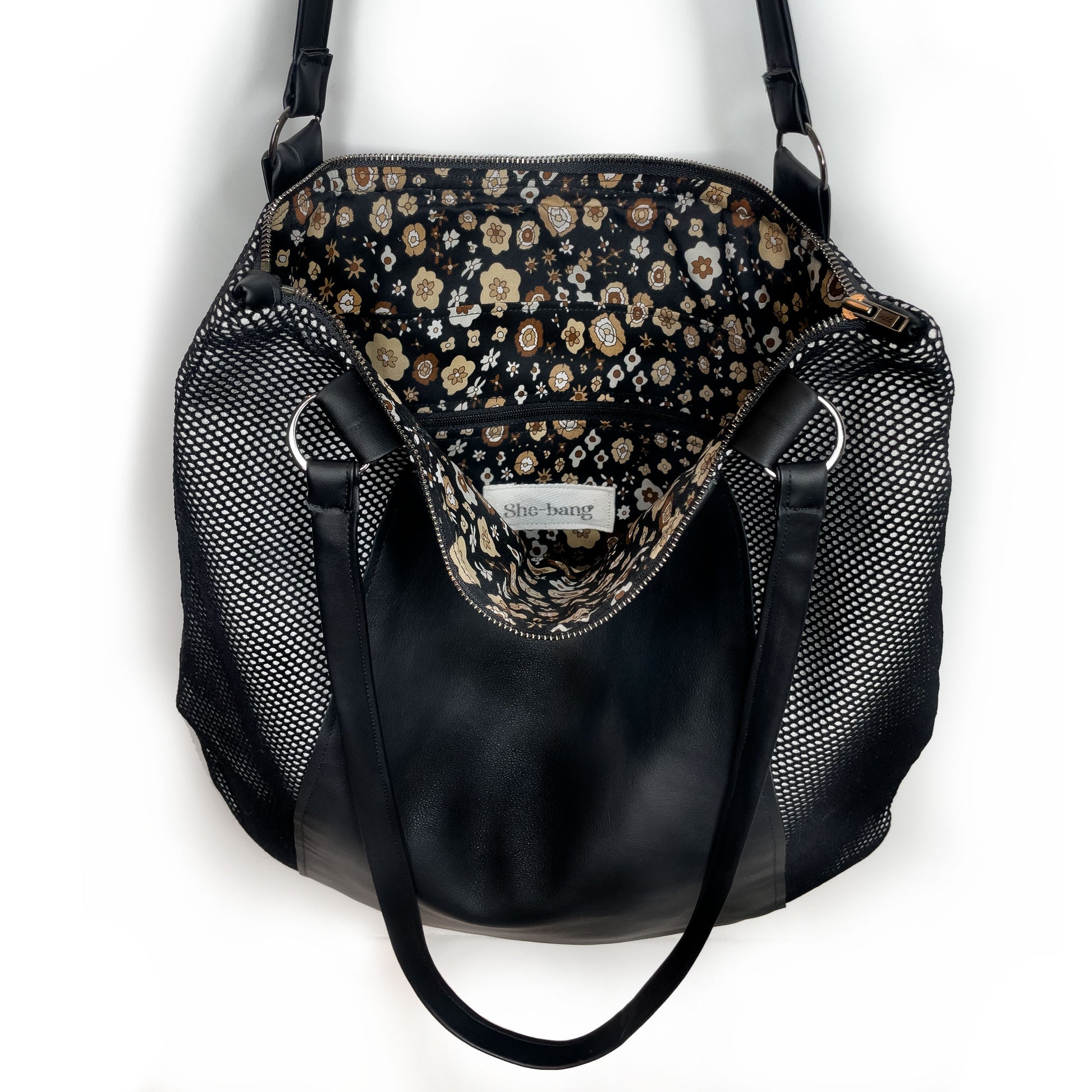 Edgy Leather bag,  black shoulder bag handmade with genuine leather  and mesh.  Unique designs handmade in Brooklyn, NY.