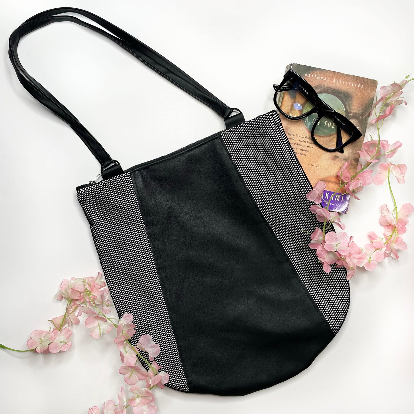 Edgy Leather bag,  black shoulder bag handmade with genuine leather  and mesh.  Unique designs handmade in Brooklyn, NY.