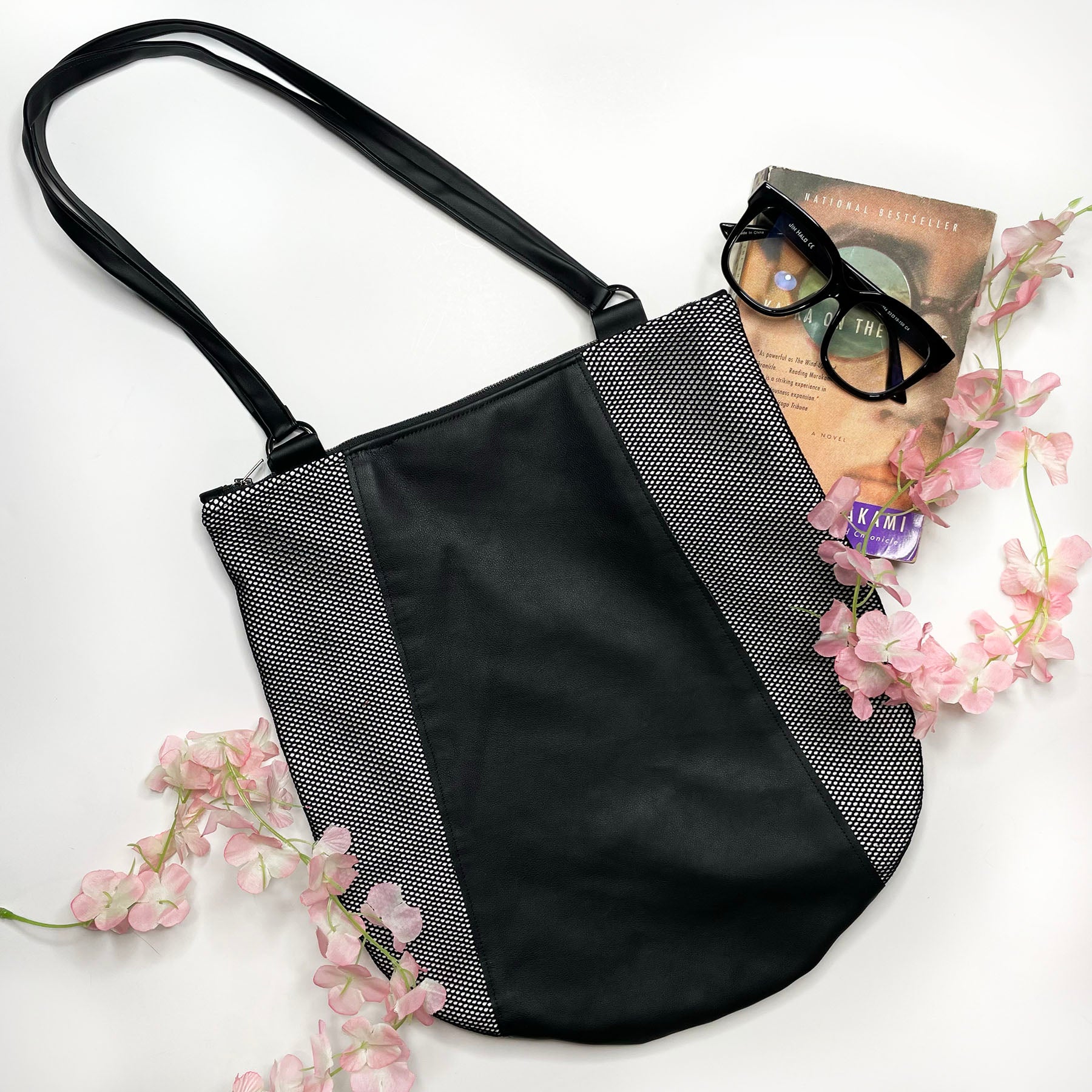 Edgy Leather bag,  black shoulder bag handmade with genuine leather  and mesh.  Unique designs handmade in Brooklyn, NY.