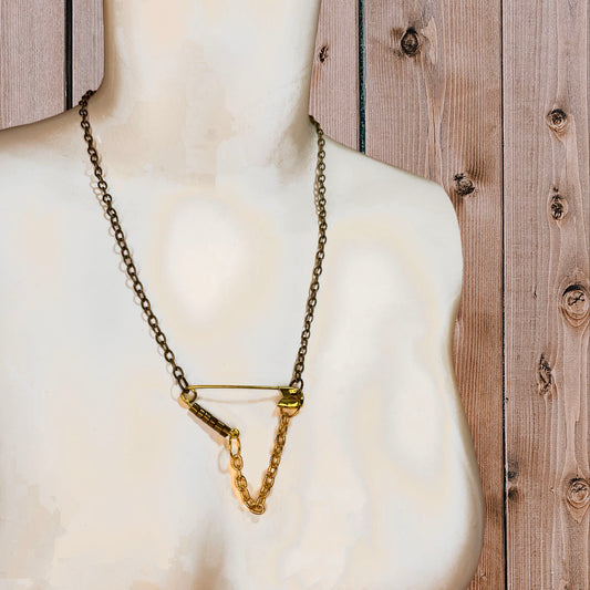 she-bang is upcycled handmade unique jewelry, Safety-pin necklace made from recycled materials and chains, completely one of a kind jewelry made by local brooklyn designers.