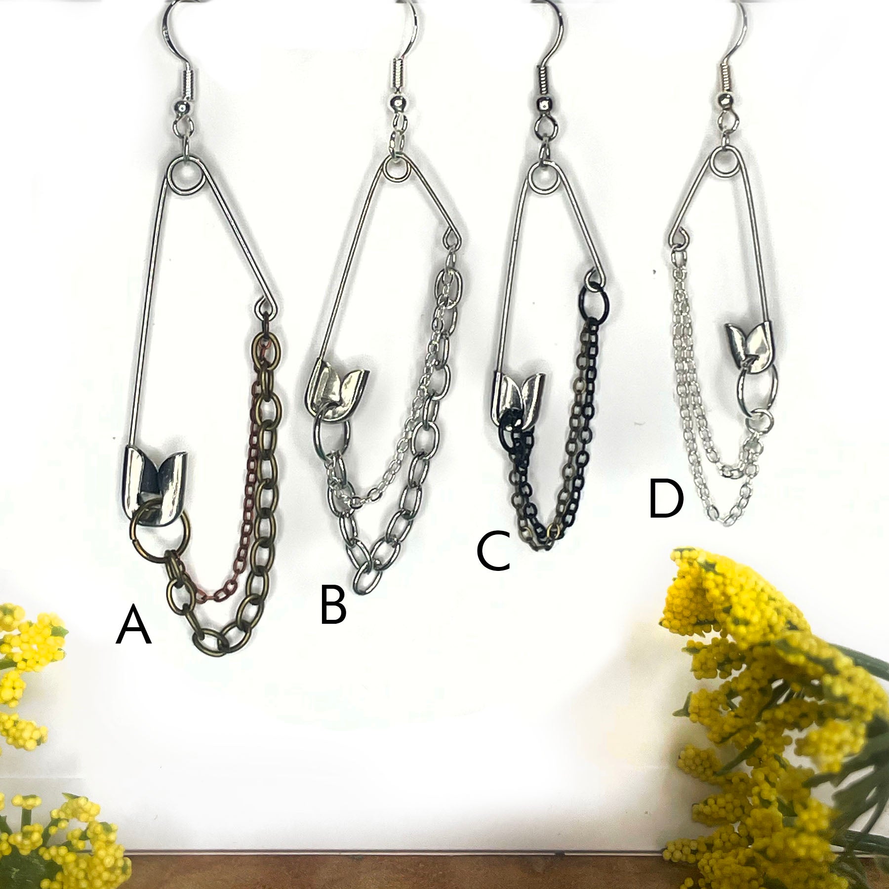 she-bang is upcycled handmade unique jewelry, Safety-pin necklace made from recycled materials and chains, completely one of a kind jewelry made by local brooklyn designers.