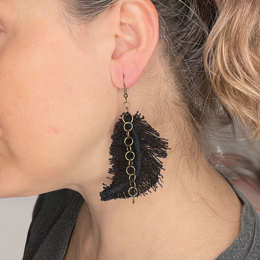 handmade unique feather earrings, unique boho jewelry, made from recycled materials and chains, completely one of a kind jewelry made by local brooklyn designers