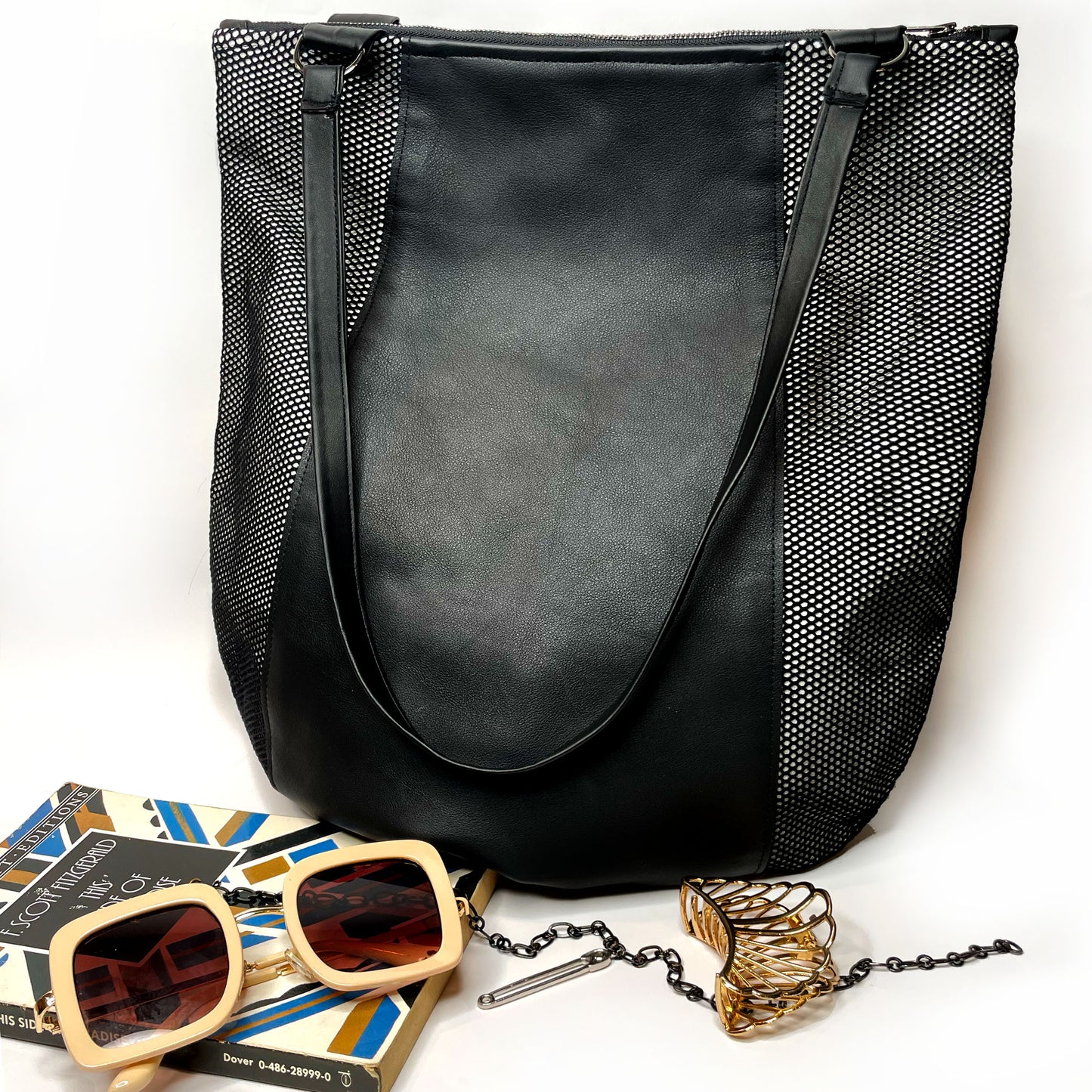 Edgy Leather bag,  black shoulder bag handmade with genuine leather  and mesh.  Unique designs handmade in Brooklyn, NY.