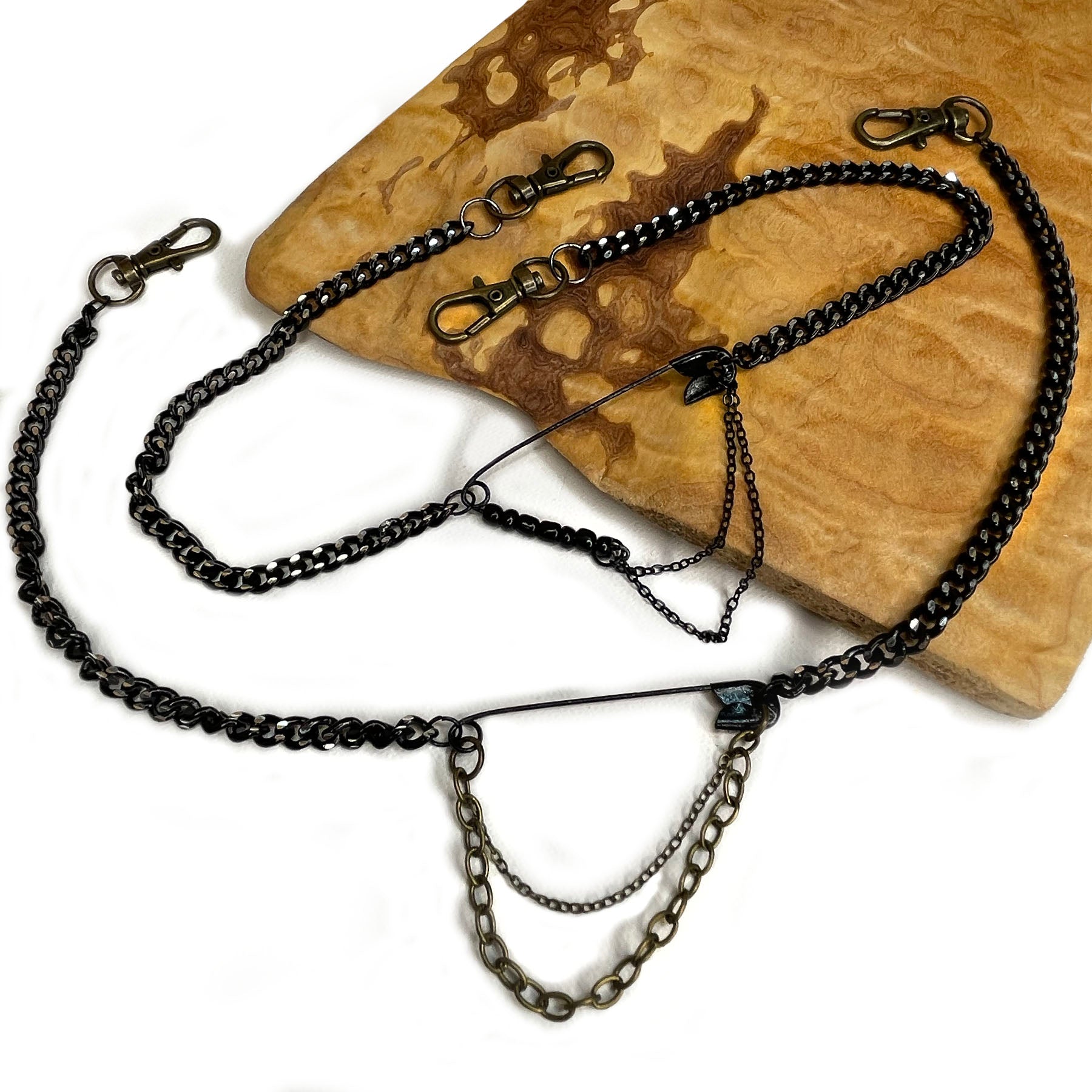 she-bang is upcycled handmade unique jewelry, Safety-pin necklace made from recycled materials and chains, completely one of a kind jewelry made by local brooklyn designers.