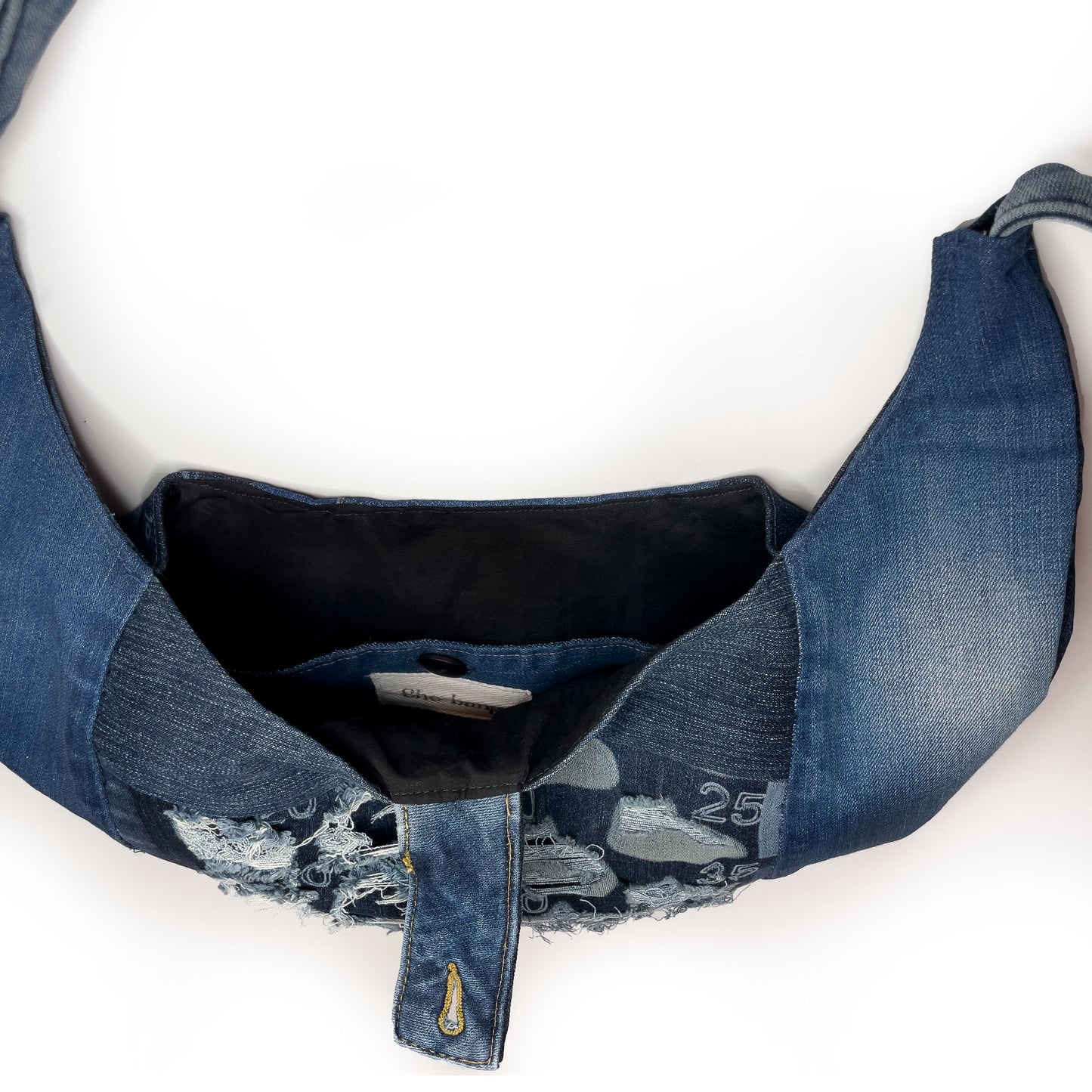 Denim Slouch bag in Indigo. handmade unique handbags, recycled denim bags, handmade genuine leather bags, completely one of a kind bags made by local brooklyn designers.